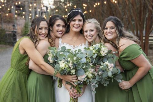 Kim and her girls in green